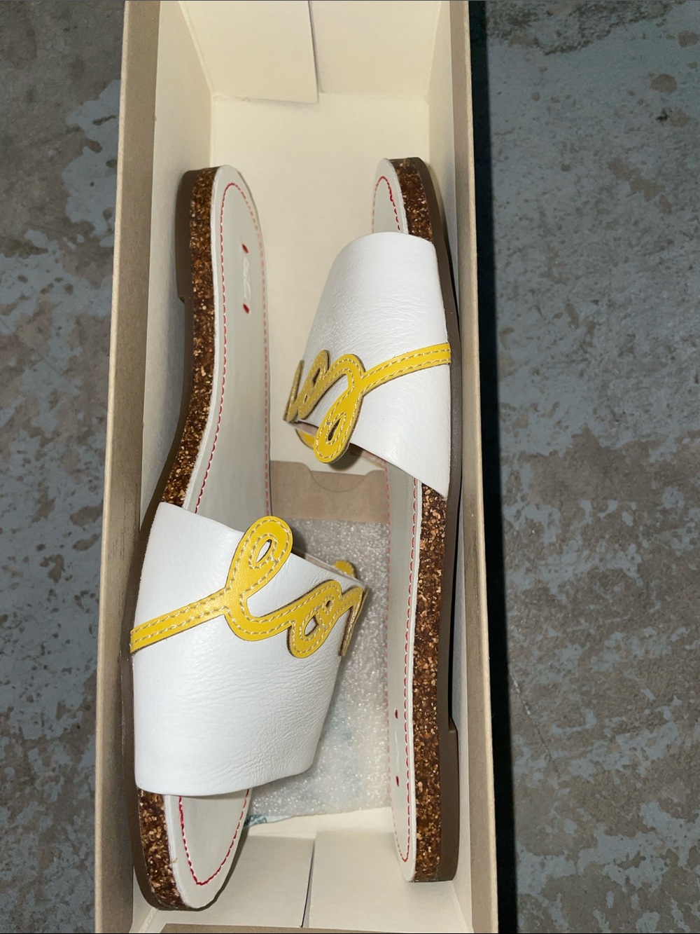 Ellen Degeneres White Slide Sandals with Yellow Script Accent
